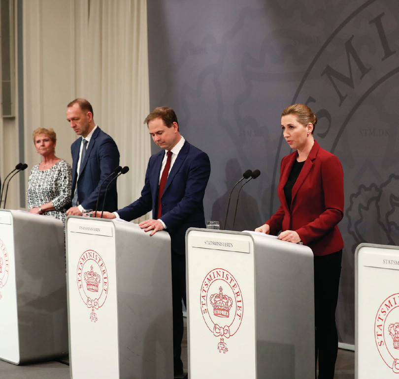 Announcing the March 2020 response to COVID-19. From right to left: Mette Frederiksen (prime minister), Nikolai Wammen (finance minister), Jacob Holbraad (CEO, Confederation of Danish Employers), Lizette Risgaard (president of the Danish Trade Union Confederation)