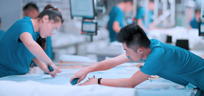 Production of made-to-measure suits, at the Kutesmart firm in Shandong, China.